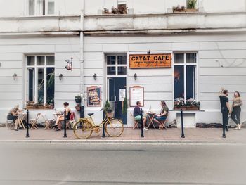 People on street in city