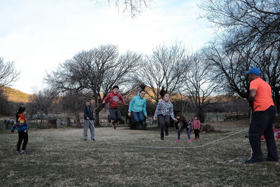 People at park against sky