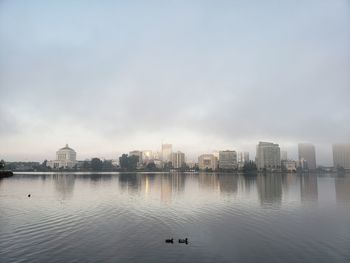 View of city buildings against sky