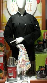 Midsection of a man standing with umbrella