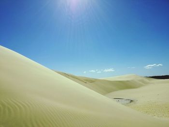 Scenic view of landscape against clear blue sky