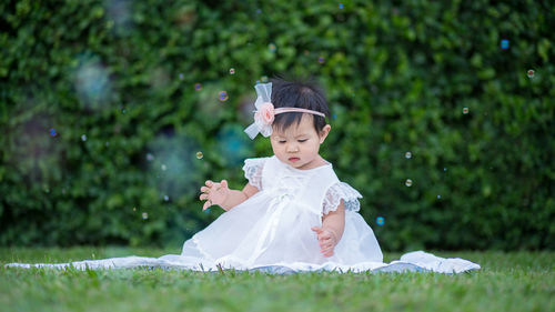 Full length of girl on field