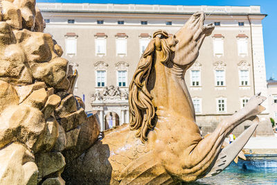 Statue of historic building in city