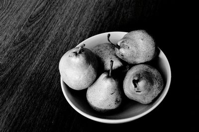 High angle view of fruits in plate on table