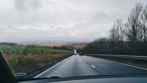 Empty road against sky