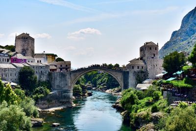 Arch bridge over river