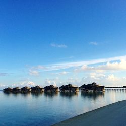 Scenic view of sea against blue sky