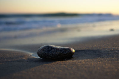 Close-up of stones on beach