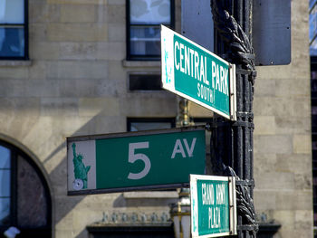 Information sign on road in city