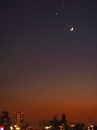 Illuminated cityscape at night