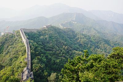 Scenic view of tree mountains against sky