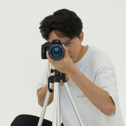 Man photographing with camera