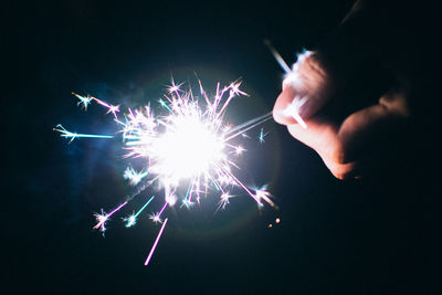 Firework display at night