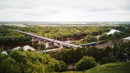 High angle view of bridge over landscape against sky