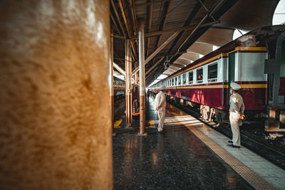 People at railroad station platform