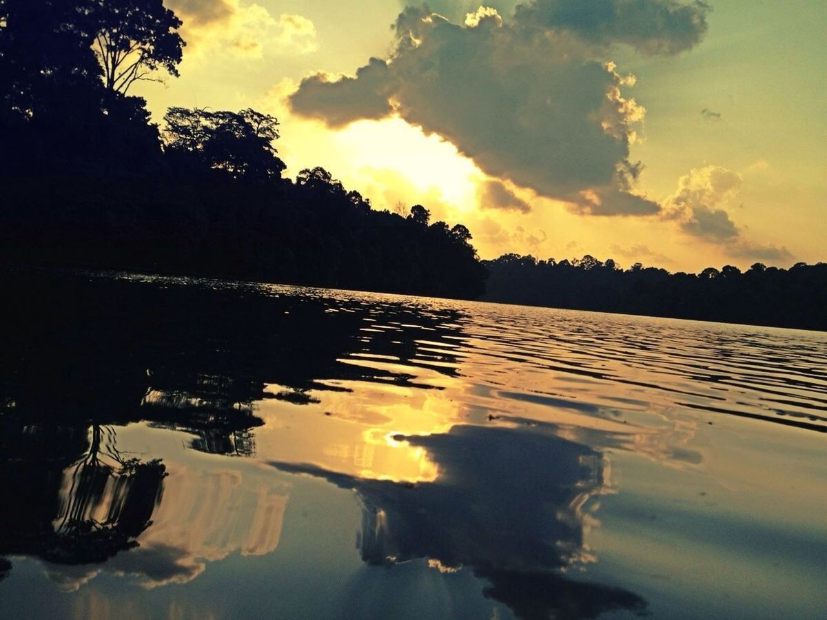 sunset, water, reflection, silhouette, sky, tranquil scene, tranquility, scenics, beauty in nature, orange color, lake, waterfront, nature, idyllic, cloud - sky, dusk, tree, cloud, outdoors, calm