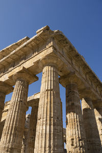 Low angle view of historic temple against clear sky