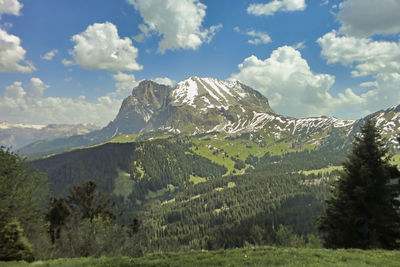 Scenic view of mountains at the seiser alm against sky