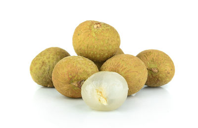 Close-up of fruits against white background