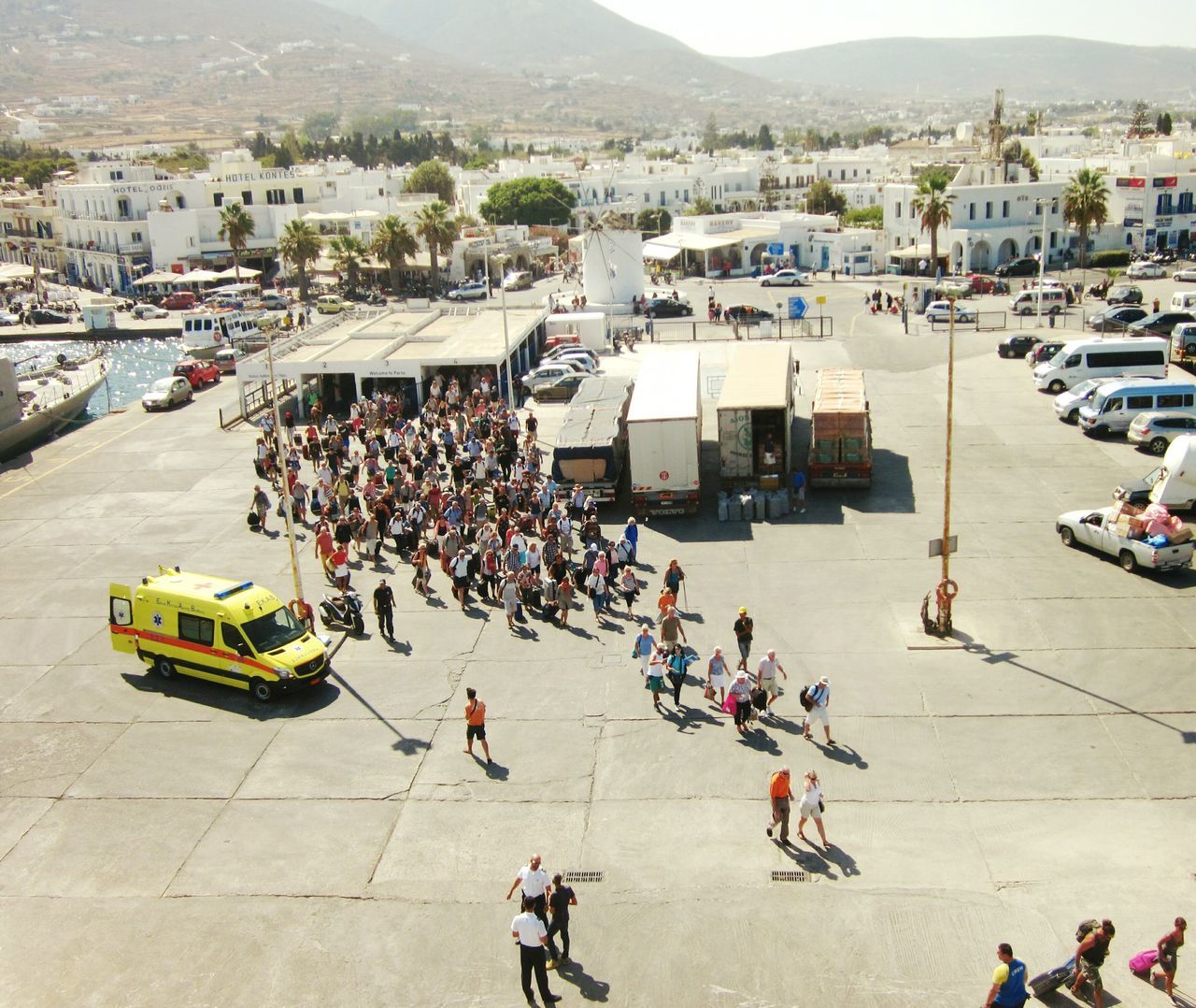 HIGH ANGLE VIEW OF CROWD ON TOWN