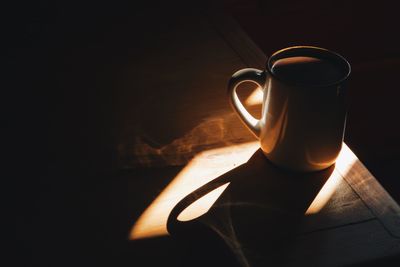 Close-up of coffee cup on table