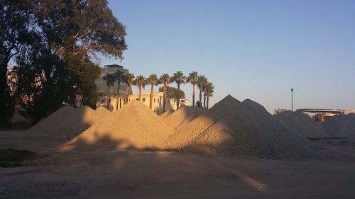 Panoramic view of built structures against clear sky