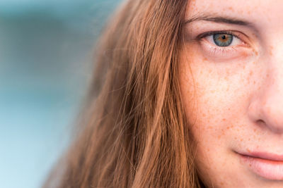 Close-up portrait of mid adult woman