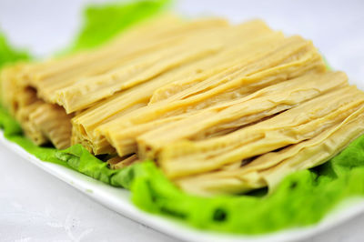 Close-up of pasta in plate on table