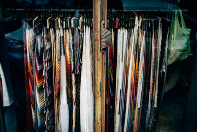 Clothing hanging on rack for sale