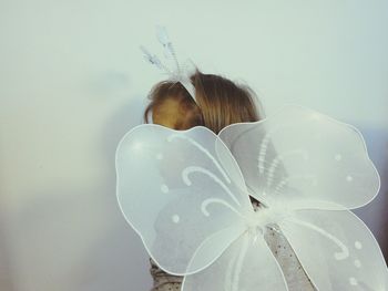 Girl wearing butterfly costume