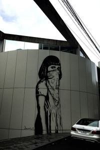 Woman standing on road