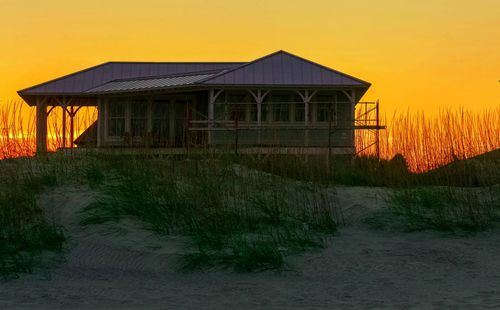 View of built structure at sunset