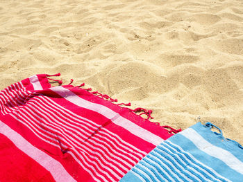 High angle view of red umbrella on beach