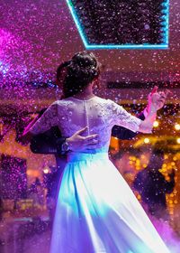 Girl playing with umbrella