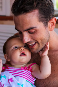 Portrait of father and daughter baby