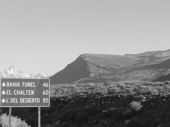 Landscape with mountain range in background
