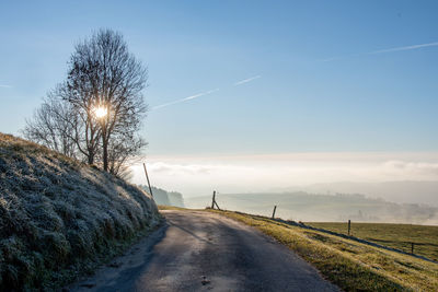View of country road against sky