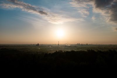 Scenic view of landscape against sky during sunset
