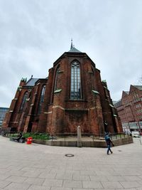 Low angle view of traditional building against sky in city