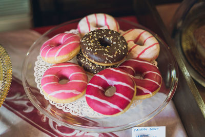 Close-up of donuts in plate on table