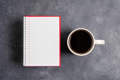 High angle view of coffee cup on table