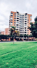 Buildings in city against sky