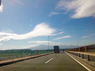 transportation, the way forward, road, diminishing perspective, sky, road marking, vanishing point, highway, mode of transport, on the move, cloud - sky, car, land vehicle, travel, railroad track, connection, cloud, cloudy, no people, country road