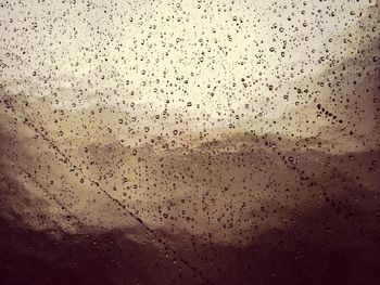 Close-up of water drops on glass