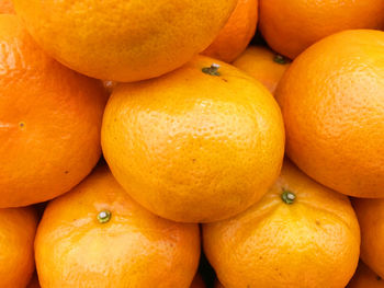 Full frame shot of oranges for sale in market