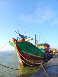 Boat in sea against sky