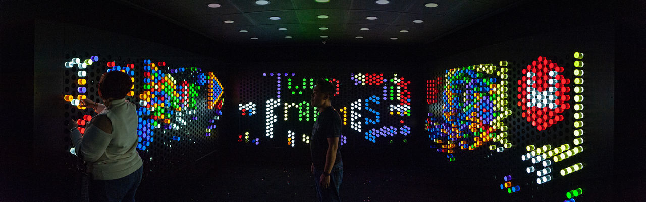 MULTI COLORED LIGHT PAINTING ON DISPLAY AT NIGHT