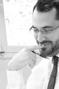 Close-up of young man wearing eyeglasses