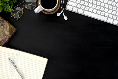 High angle view of coffee cup on table