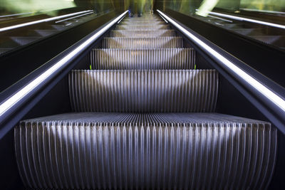 High angle view of illuminated escalator